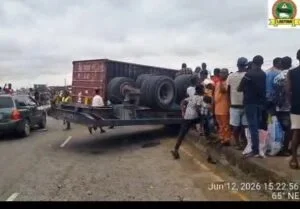 JUST IN: Two trucks, car collide on Lagos road